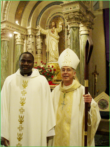 Fr. Allan Alaka with his Excellency Mark J. Seitz  {Photo by www.catholicwebexperts.com}